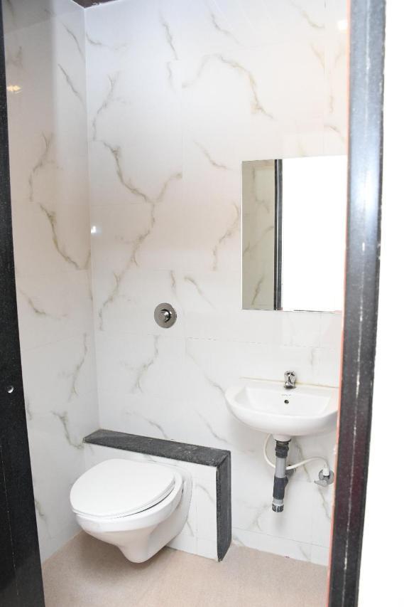 Hotel Sai Shatabdi Shirdi Rum bild